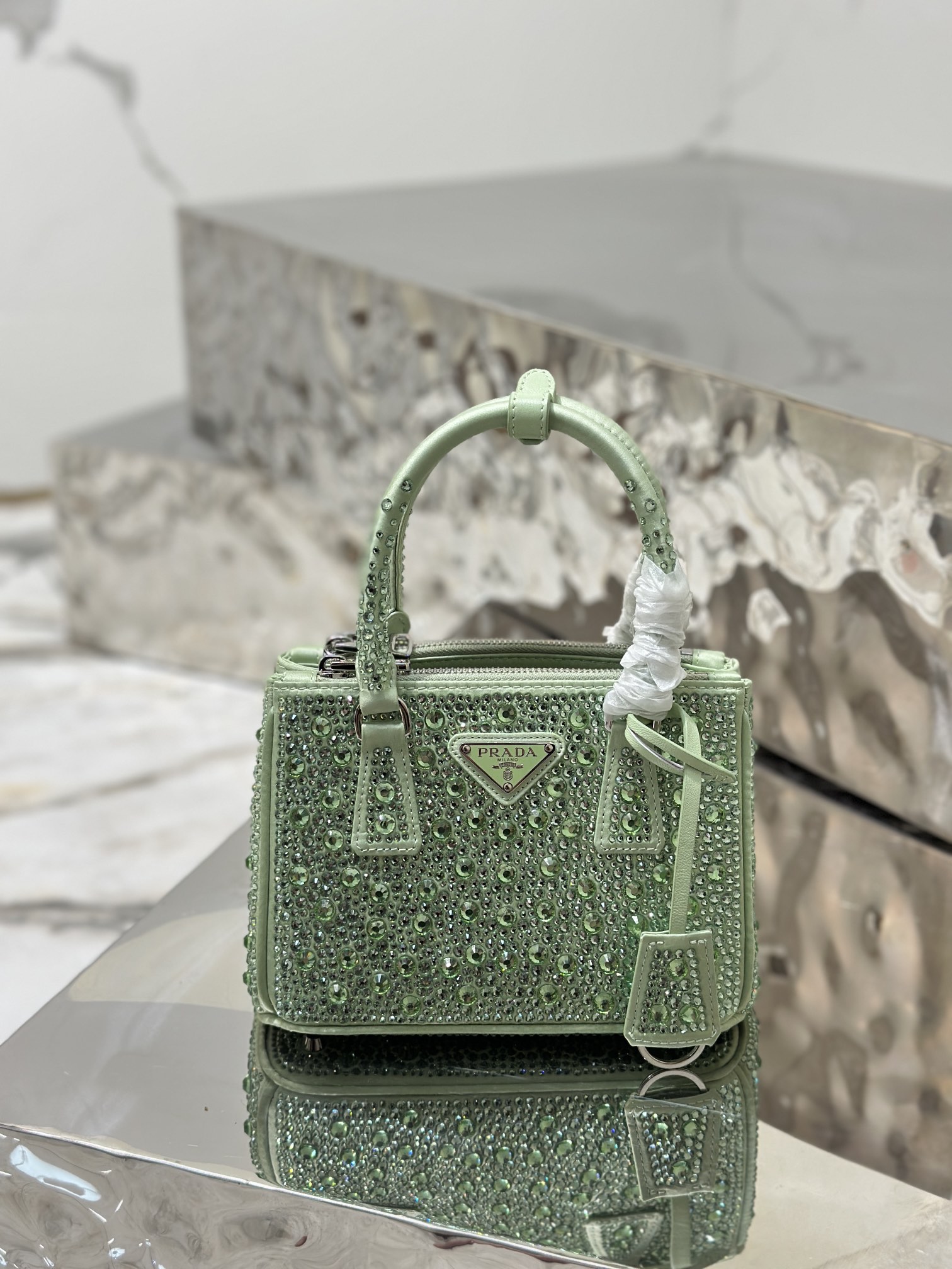 Bagsaaa Pra*a Galleria satin mini-bag with green crystals - 20*14.5*9.5cm