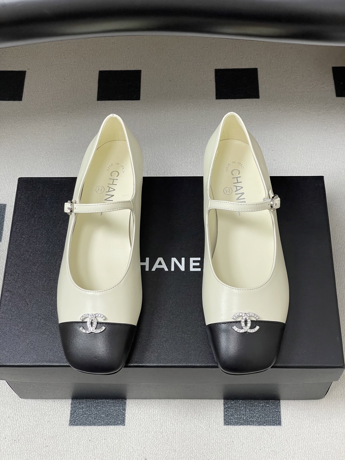 Bagsaaa Ch**el black & white Mary Jane flats with crystal-embellished CC