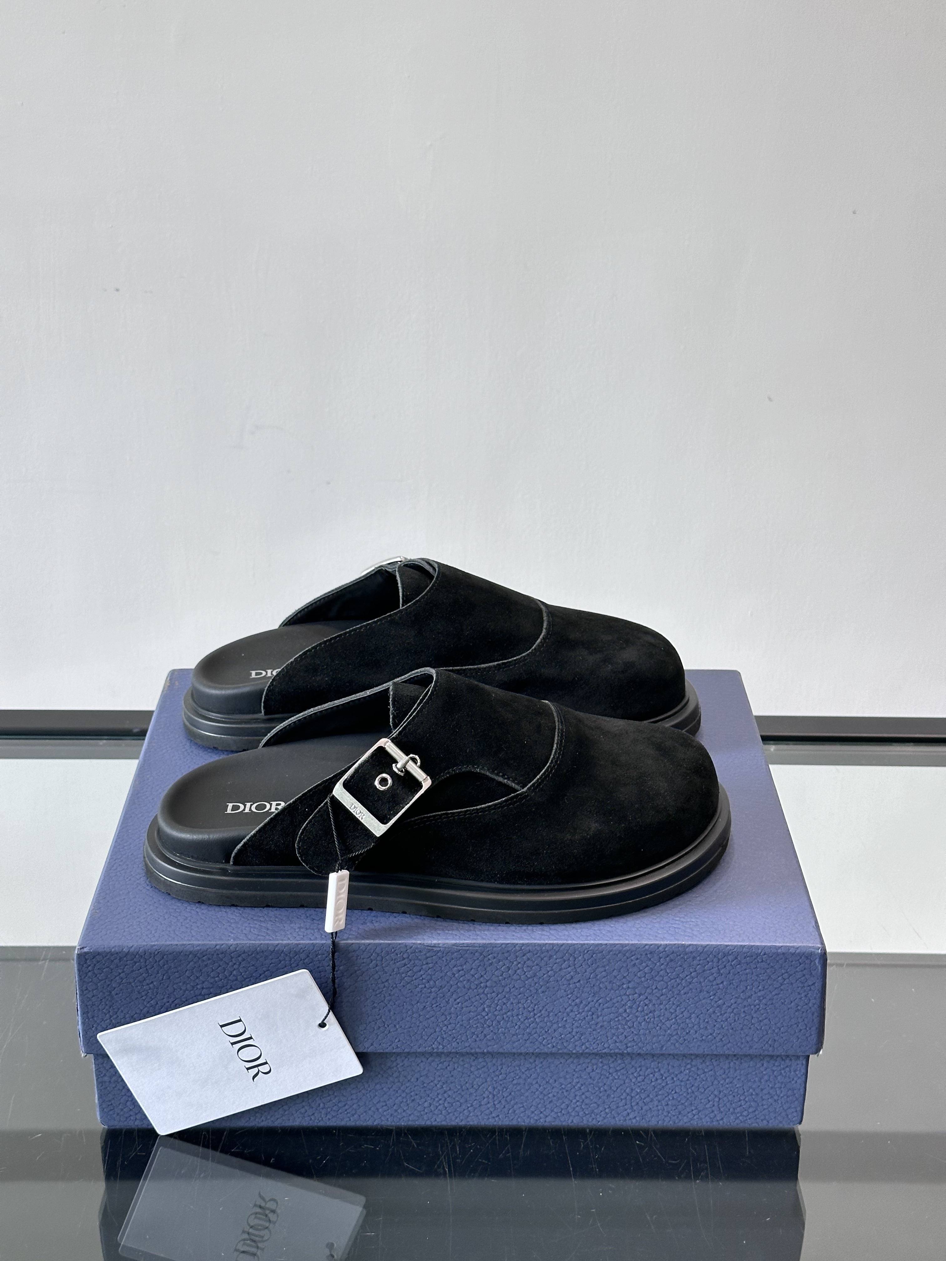 Bagsaaa D10r black mules with silver buckle