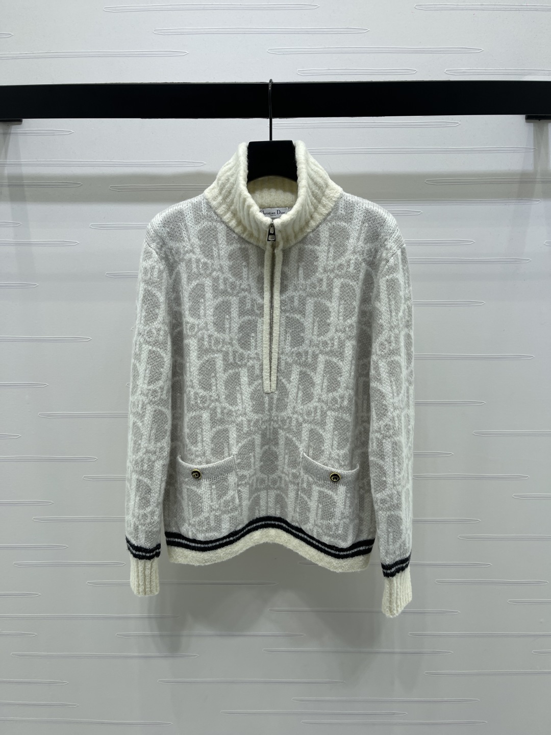Bagsaaa D10r Oblique pattern half-zip sweater in a gray and white wool blend