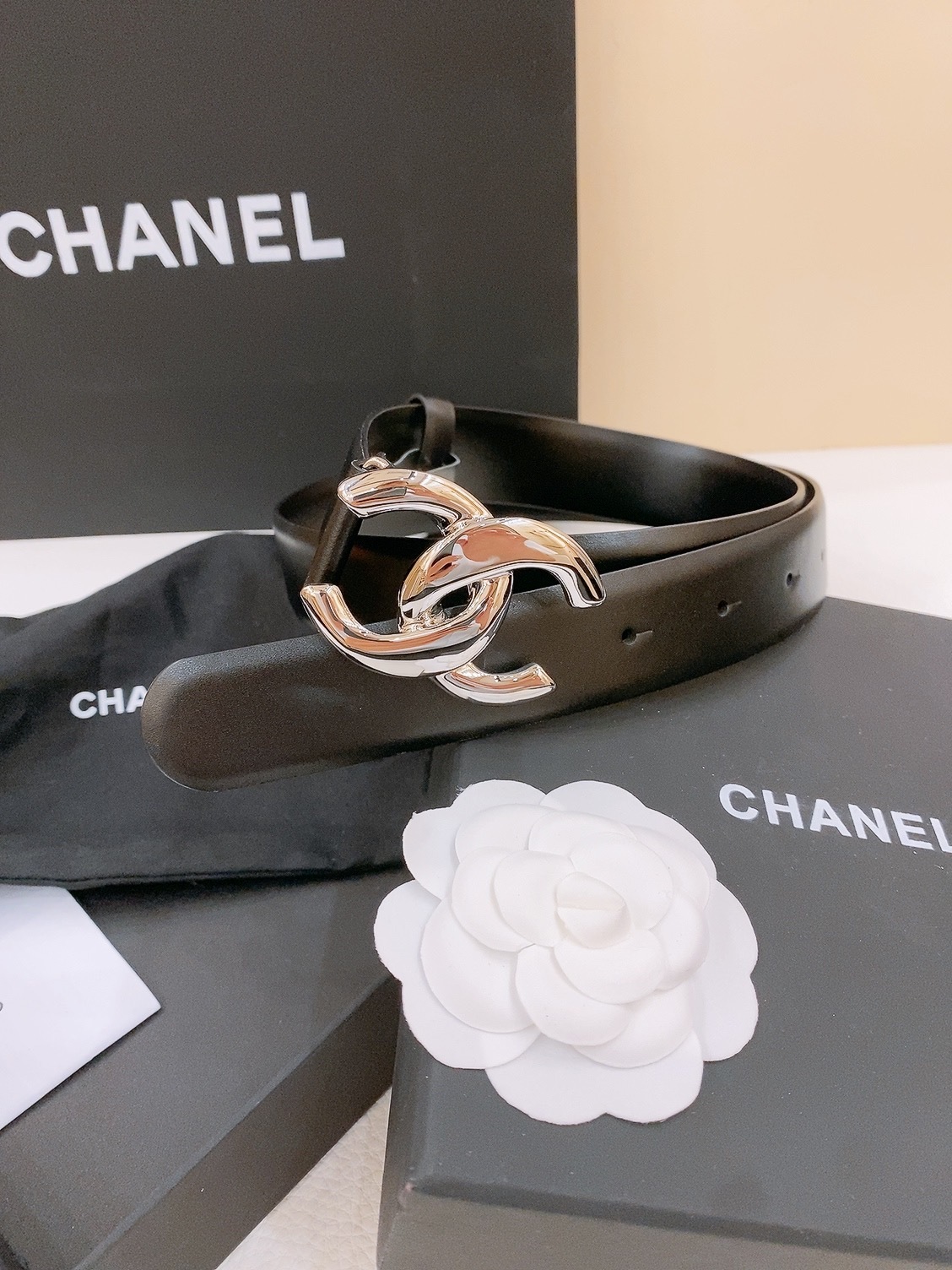 Bagsaaa Ch**el black leather belt with a gold-tone interlocking CC logo buckle